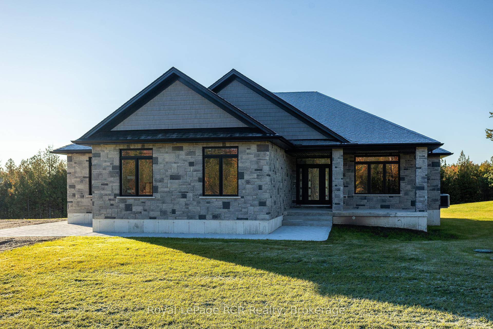 Custom built stone bungalow on 1.
