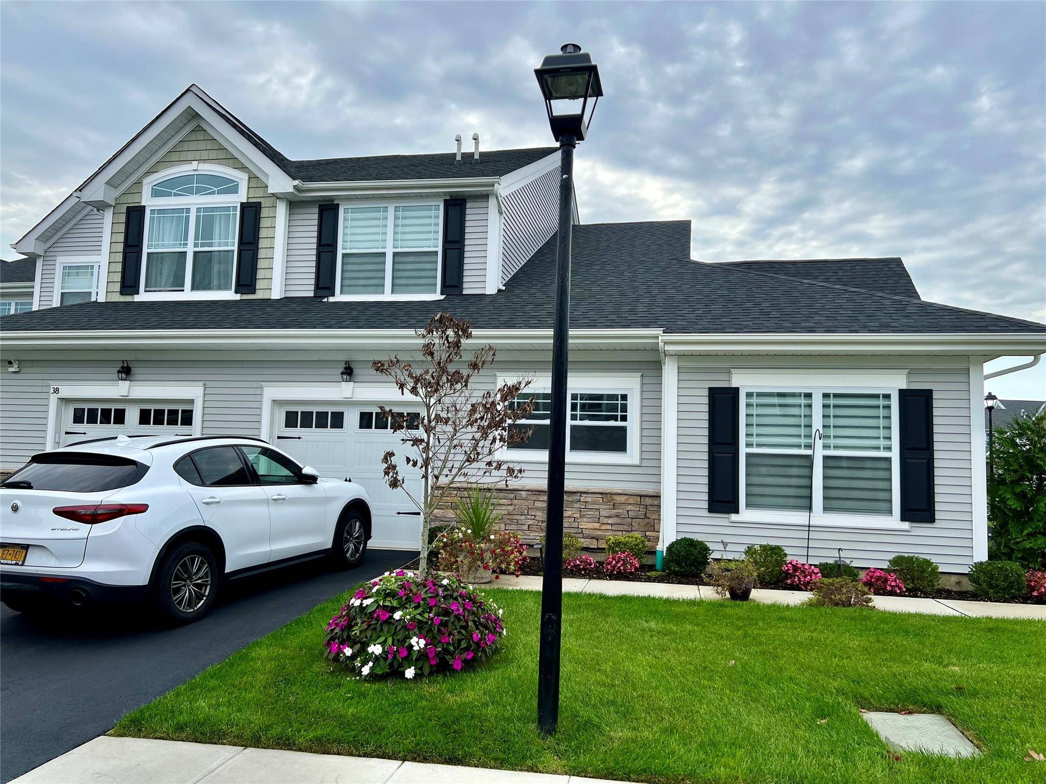 Beautiful brand new 2 story townhouse in Coram in a brand new community, primary bedroom first floor 2 additional bedrooms upper level also a two story entry level lower level ...