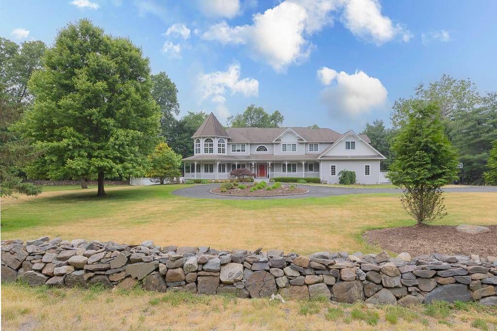 Stunning Custom Built Victorian Colonial on nearly 2 acres of Park like private property.