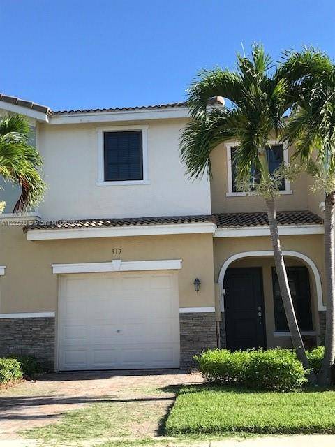 BEAUTIFUL TOWNHOUSE LIKE NEW IN AVENTURA ISLES, RENTED FOR 2900.
