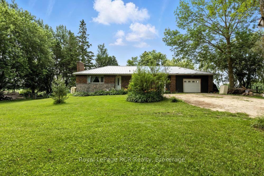 Tucked away on a peaceful 3 4 acre lot, this 3 bedroom bungalow offers country living without the fuss.