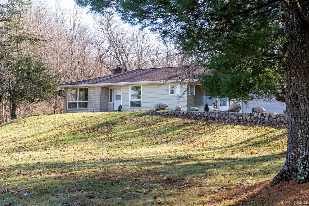 Charming one level home located on a scenic road just minutes to the Village of Millbrook.
