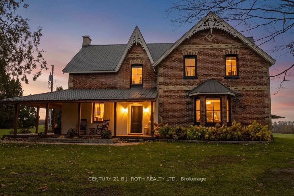 This timeless all brick Victorian farmhouse, set on over 3 acres of gently rolling countryside, perfectly blends 1800s character with modern sophistication.