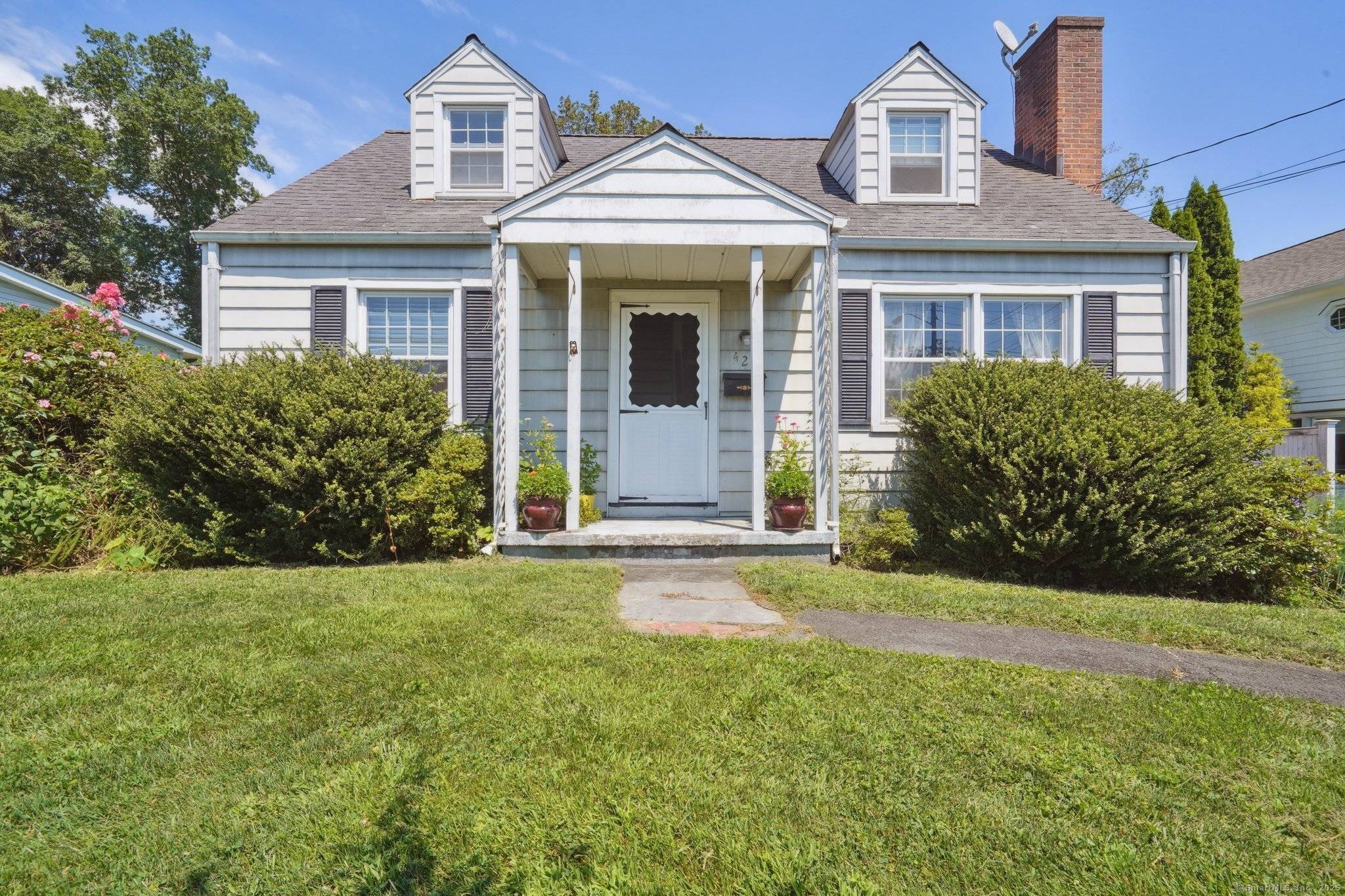 This charming Cape in the Cove offers convenient access to the beach.