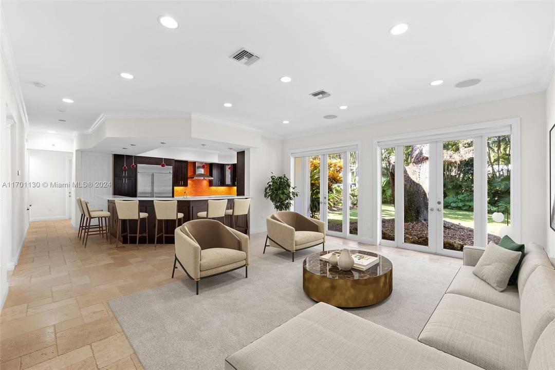 A Miami Signature Home Twelve Twelve Manati, a residence perfectly crafted for large and extended families, located in the prestigious South Gables neighborhood.