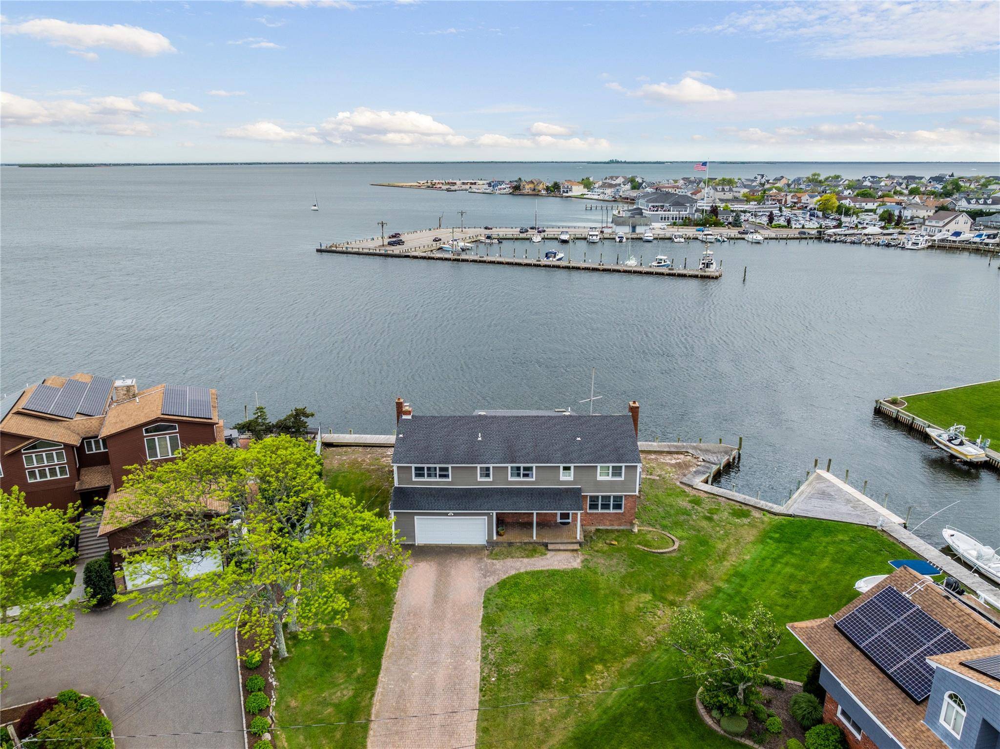 Wake up every day to million dollar views and endless possibilities in this rare and sought after waterfront location in West Islip.