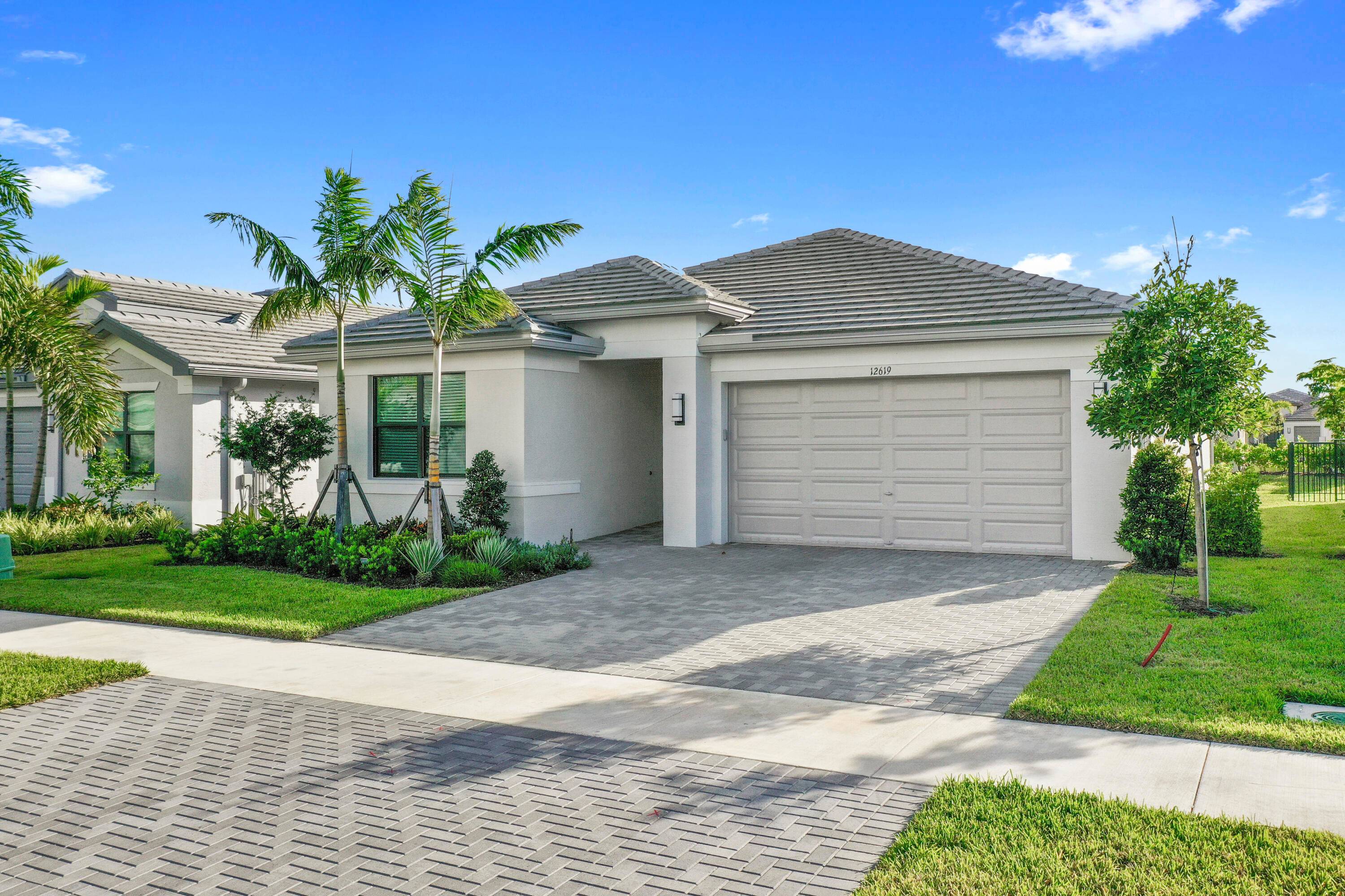 Welcome to your dream home in the desirable Valencia Walk at Riverland, an exceptional 55 active community.