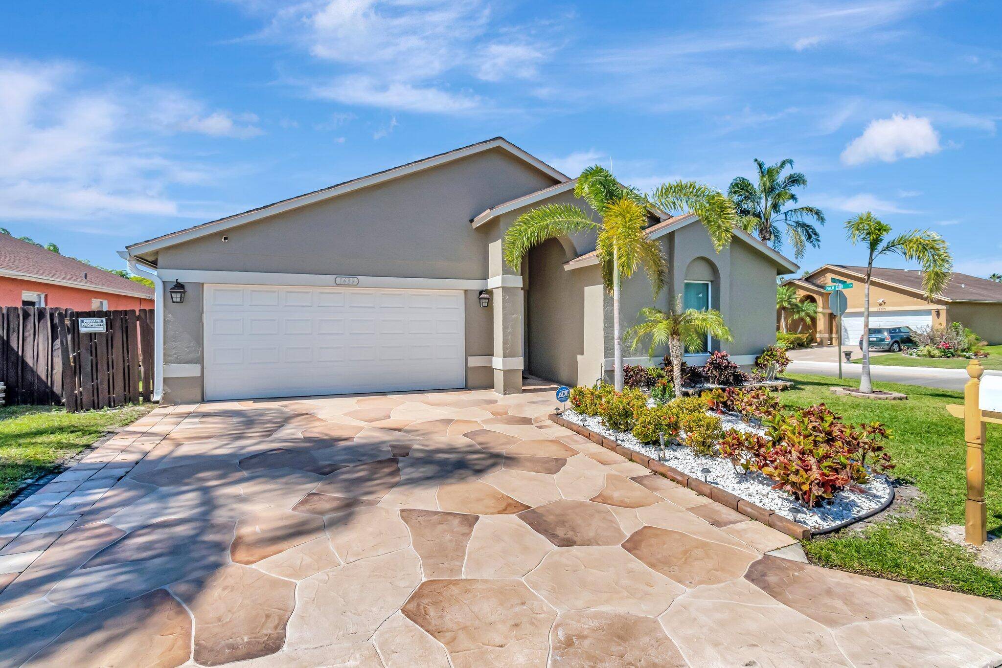 ENERGY SAVING IMPACT GLASS WINDOWS AND DOORSTour 1439 Waterway Cove Drive, a meticulously remodeled haven located in Wellington, FL.
