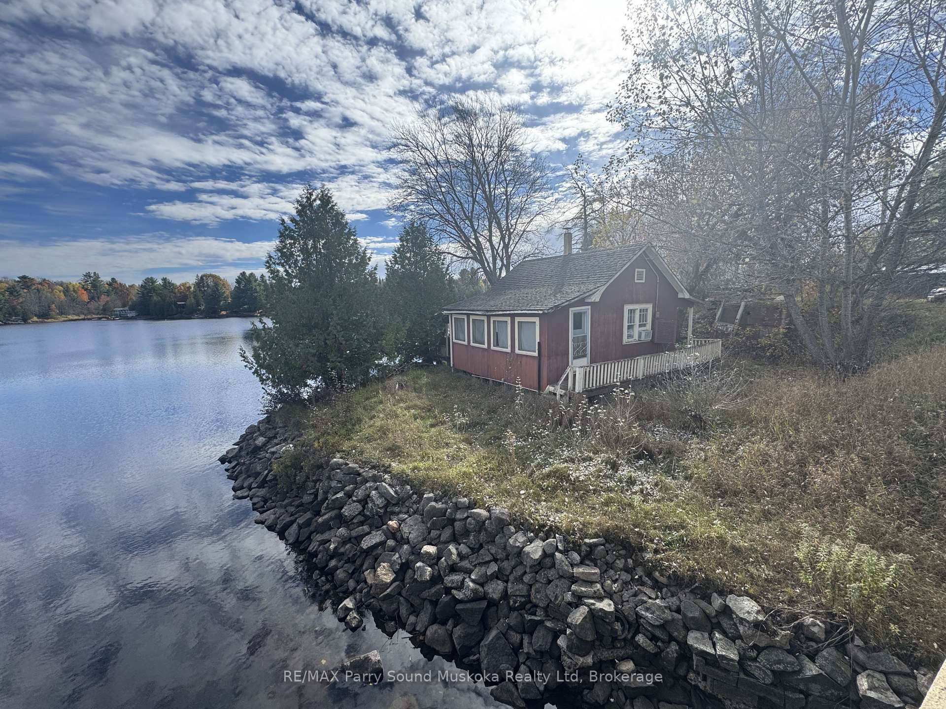 This property features 116 feet of natural waterfront on the sought after Whitestone Lake.