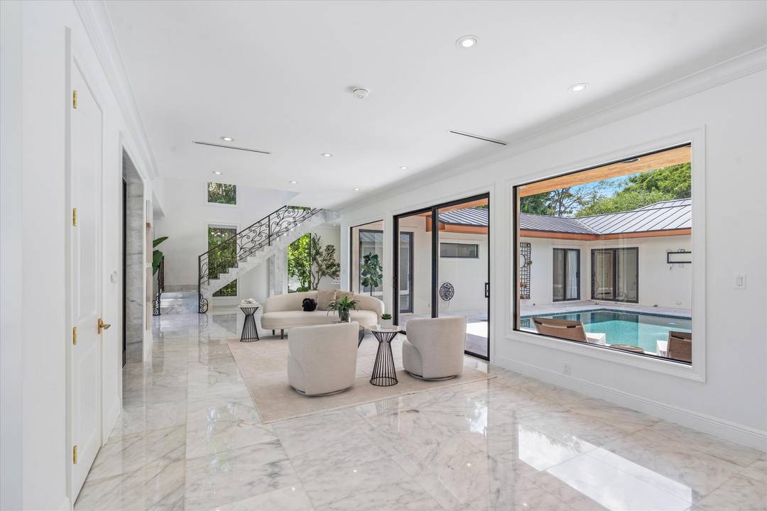 Located in the prestigious gated community of Rolling Hills, this exceptional estate offers privacy, architectural character, and an ideal multi level layout designed for both comfort and entertaining.