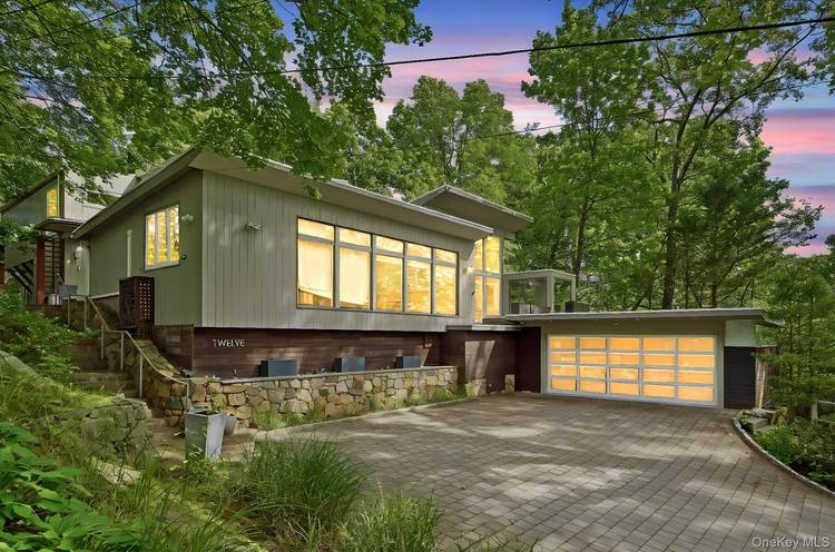 Experience luxury living in one of Edgemont s most coveted and convenient locations, perfectly situated within walking distance to all schools, the train station, shops, restaurants, and the vibrant Scarsdale ...