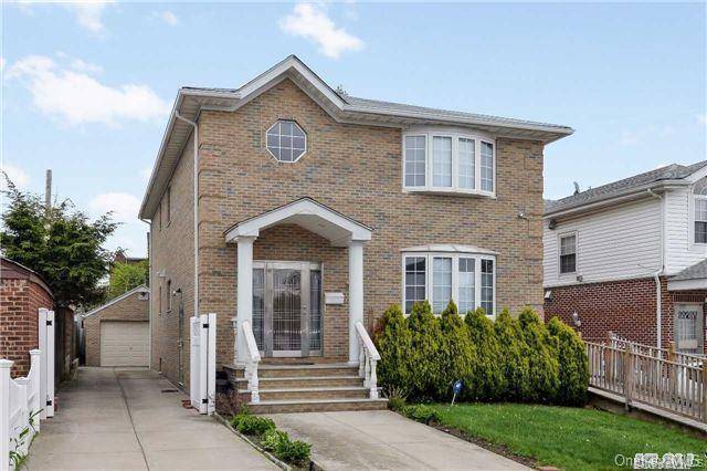 Renovated Bright 4 Bedroom 2 Bath With easy street parking, open kitchen, private balcony, well sized rooms, and in unit washer dryer.