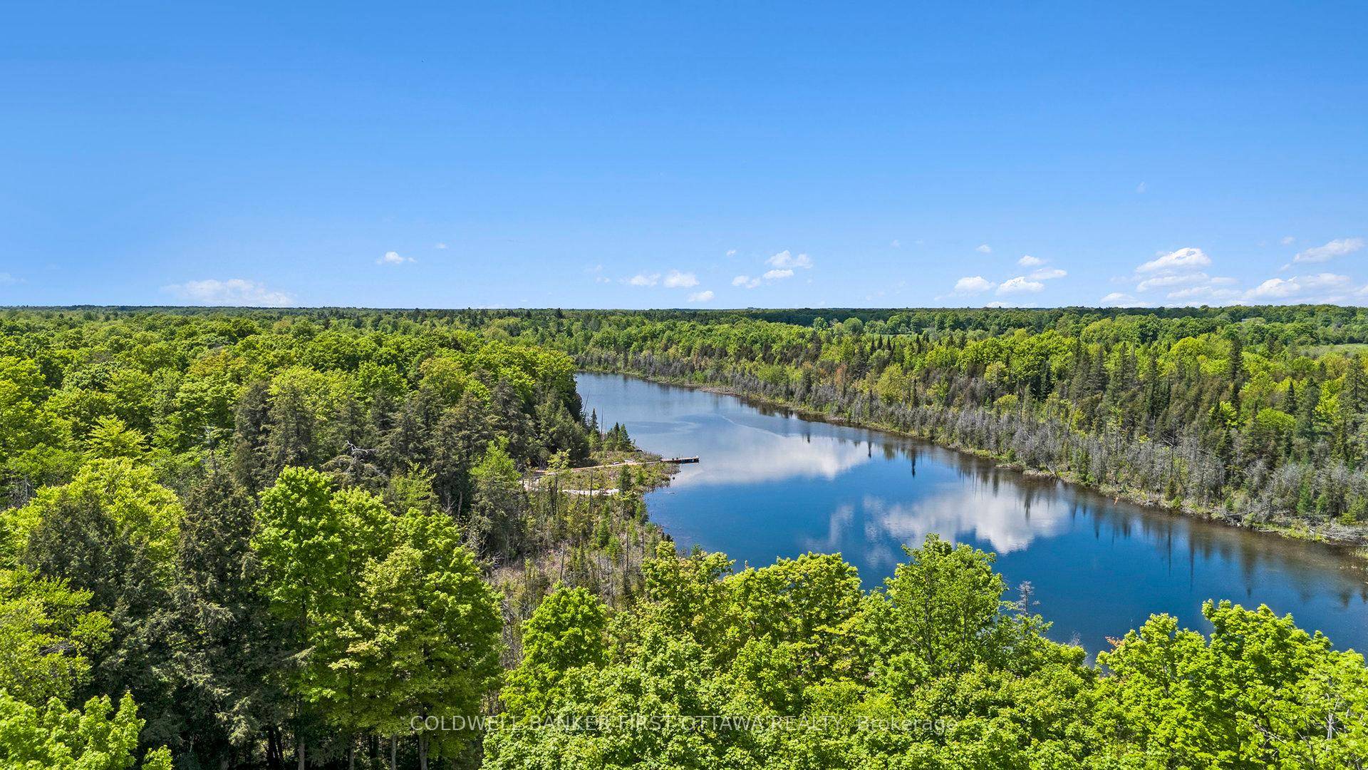 Discover a rare opportunity to own the last available building lot on peaceful Doctor Lake in the serene community of Trillium Estates, Drummond North Elmsley, Ontario.
