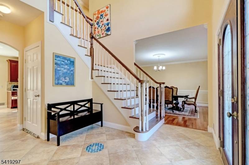 Builder's Own Custom Center Hall Colonial built to the highest standards, this stunning custom Colonial rests on a 2 3 acre lot within walking distance to top rated schools and ...