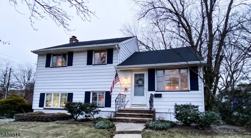 Spacious expanded 4 bedroom split level home situated on a large corner lot.