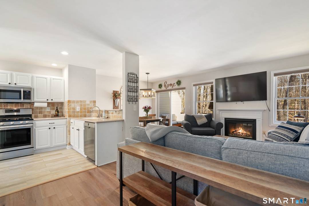 Enjoy effortless living in this impeccable tri level Acorn model townhome offering exceptional natural light and privacy in the sought after Sterling Woods community.