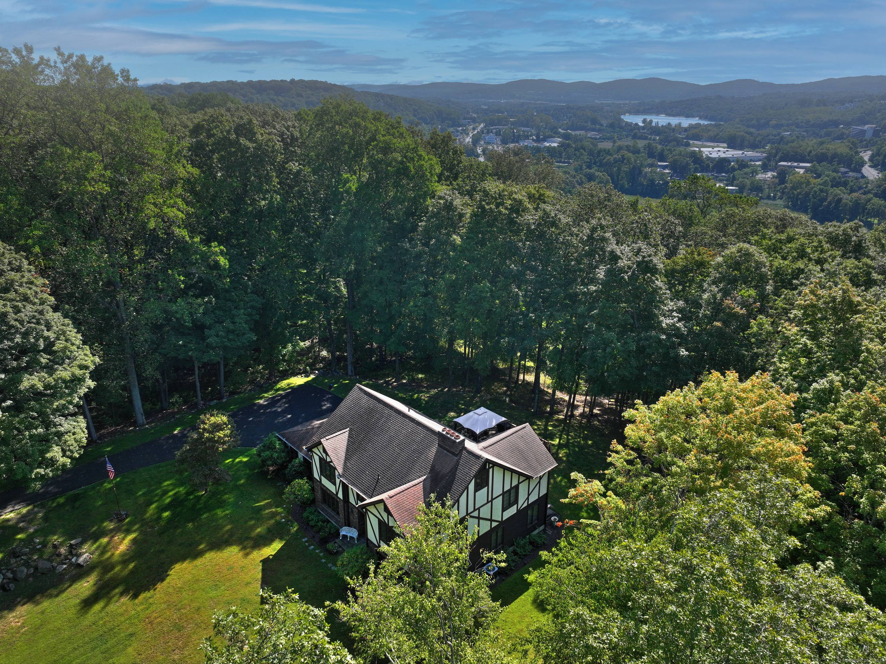 A rare opportunity to own this stately Tudor in one of the area's most distinguished subdivisions, Wintergreen Hill Estates.