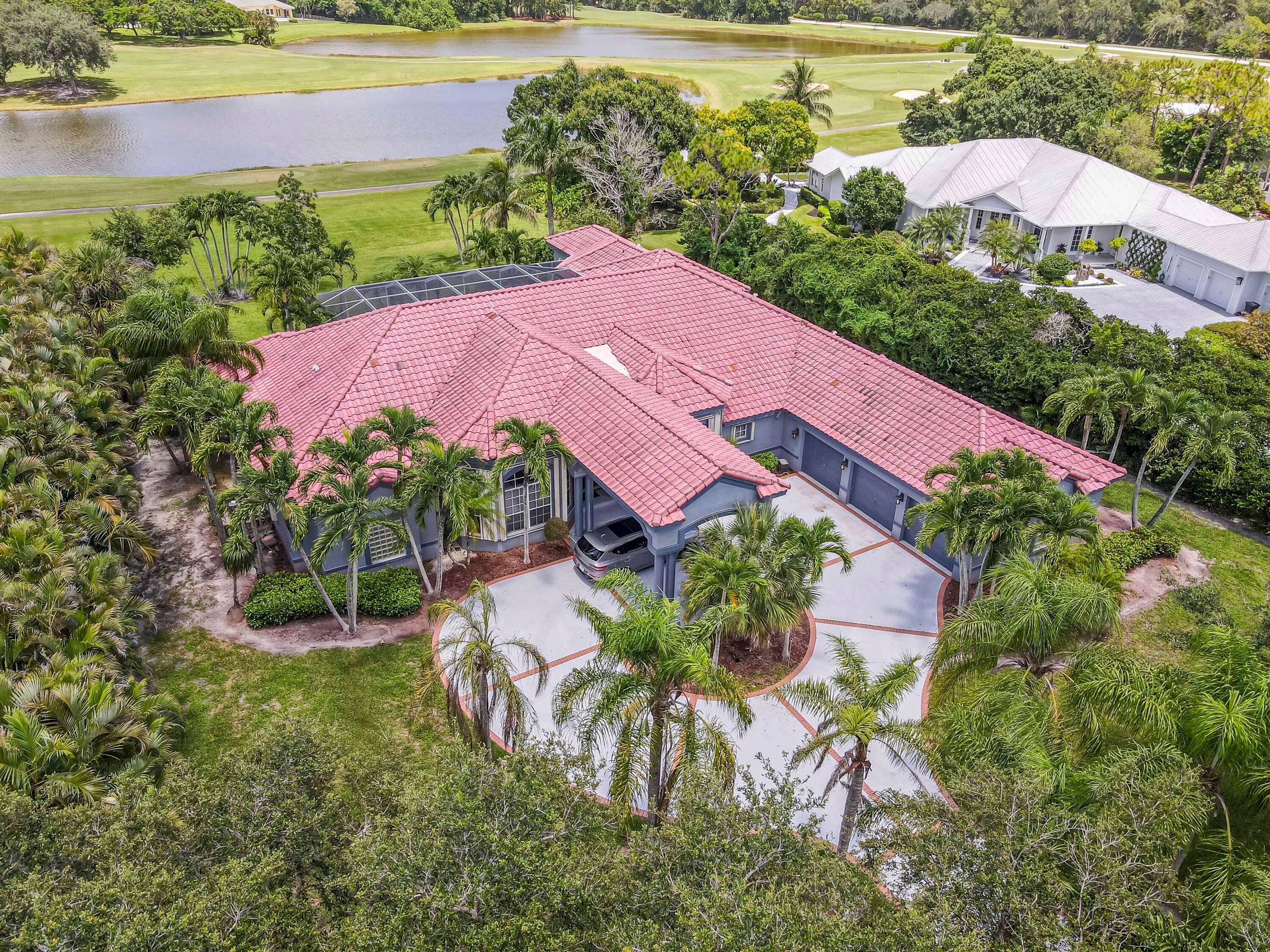 Wonderful open floor plan built on cul de sac overlooking wide expanse of golf and lake.