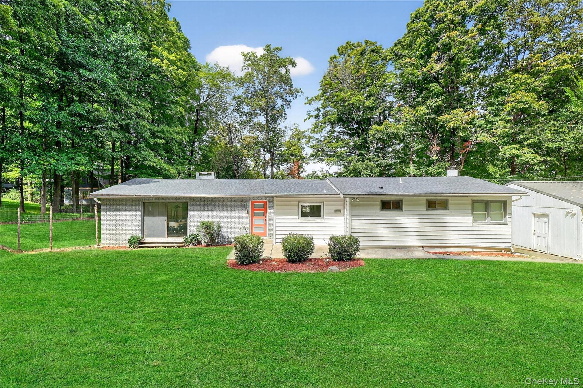 Light and nature define this beautifully updated mid century home, where every detail has been thoughtfully redesigned to create a seamless connection between indoor living and the outdoors.