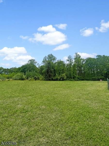 Your dream house can be built in this rural setting with unmatched privacy at the end of a private drive backing to National Wildlife Refuge.