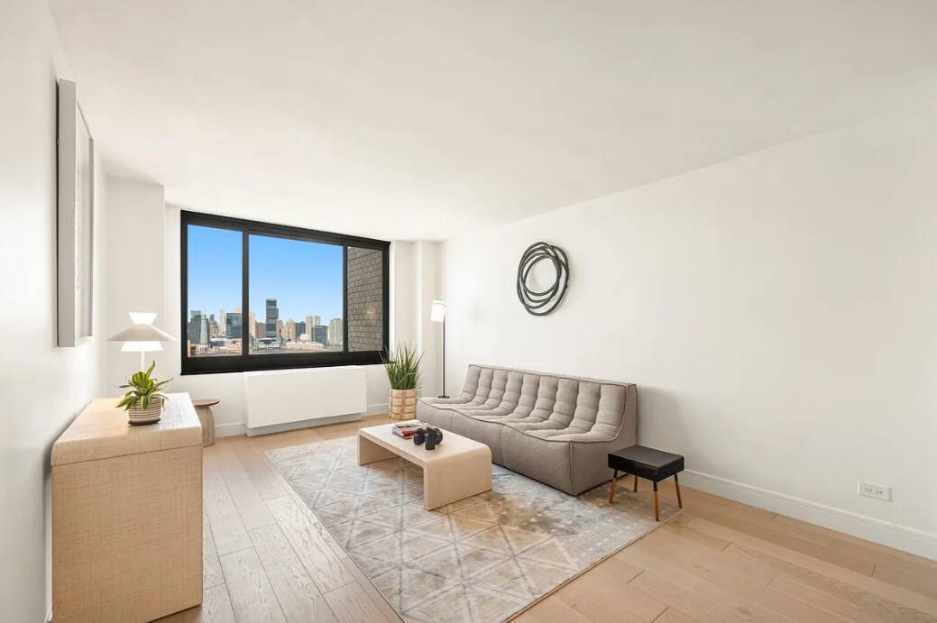 This is it ! ! ! Your chance to own a STUNNINGLY RENOVATED NEW APARTMENT with amazing views in Liberty Court.
