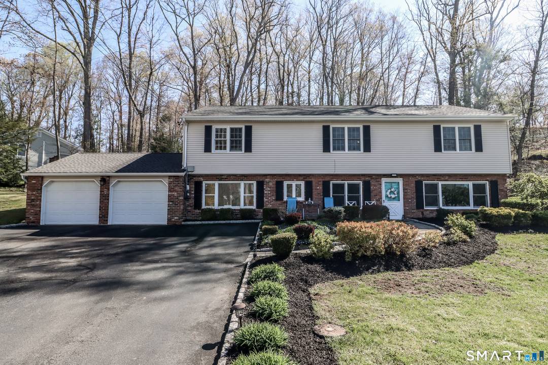 Located on a desirable cul de sac in Brookfield, this lovingly maintained and updated 4 bedroom Colonial offers over 3, 100 sq ft on 1.