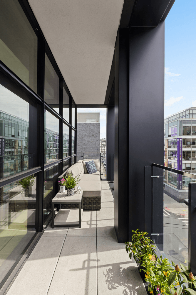 Welcome to 215 North 10th Street 4F, a corner 3 bedroom, 2 bath home featuring soaring ceilings, oversized black clad windows, and two private terraces that seamlessly connect indoor and ...