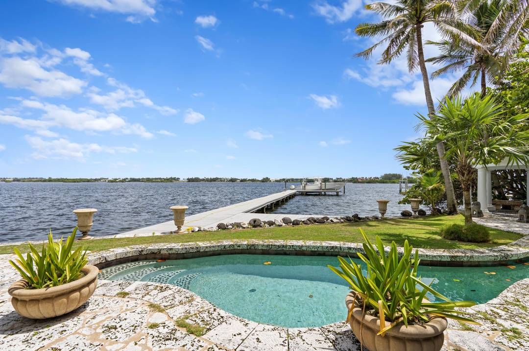 Located directly on the intracoastal, this single story home is a perfect seasonal rental for someone searching for a tropical island feel, expansive water views yet quick access to Palm ...