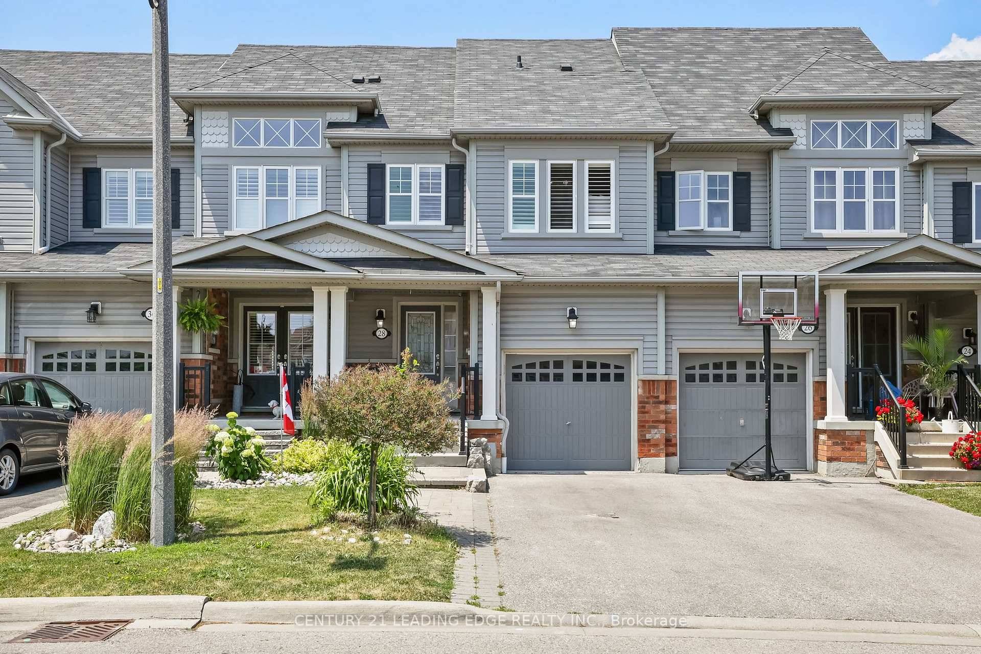 Welcome To This Beautifully Updated Freehold Townhouse Located In The Heart Of Whitby Shores.