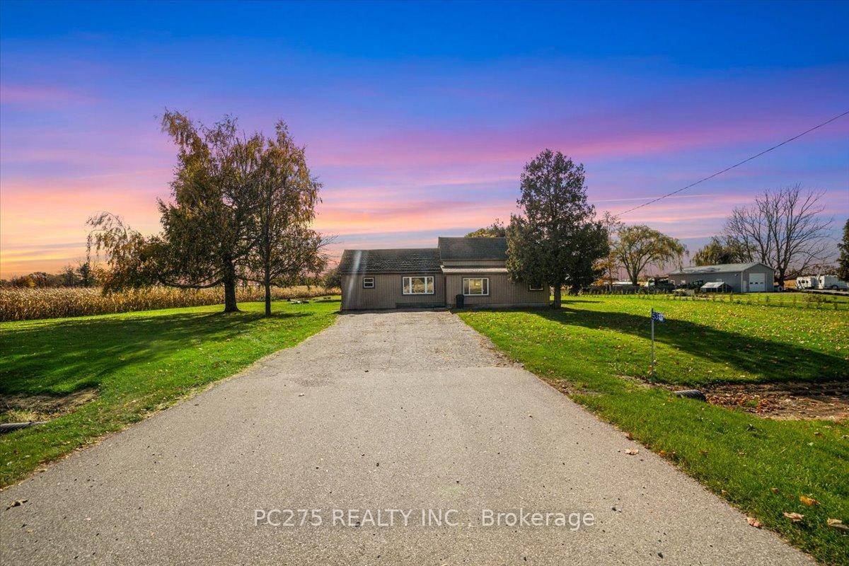 Check out this spacious farmhouse, remodeled to include an expansive vaulted ceiling over the great room dining, living space when you first enter the home clad in charming wood finishing.