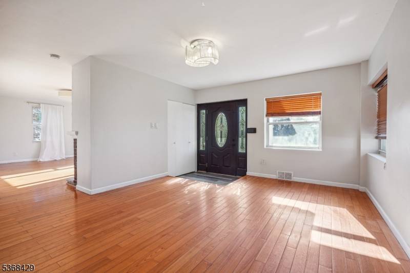 Updated and spacious single family home with two car garage, large backyard, and washer dryer !