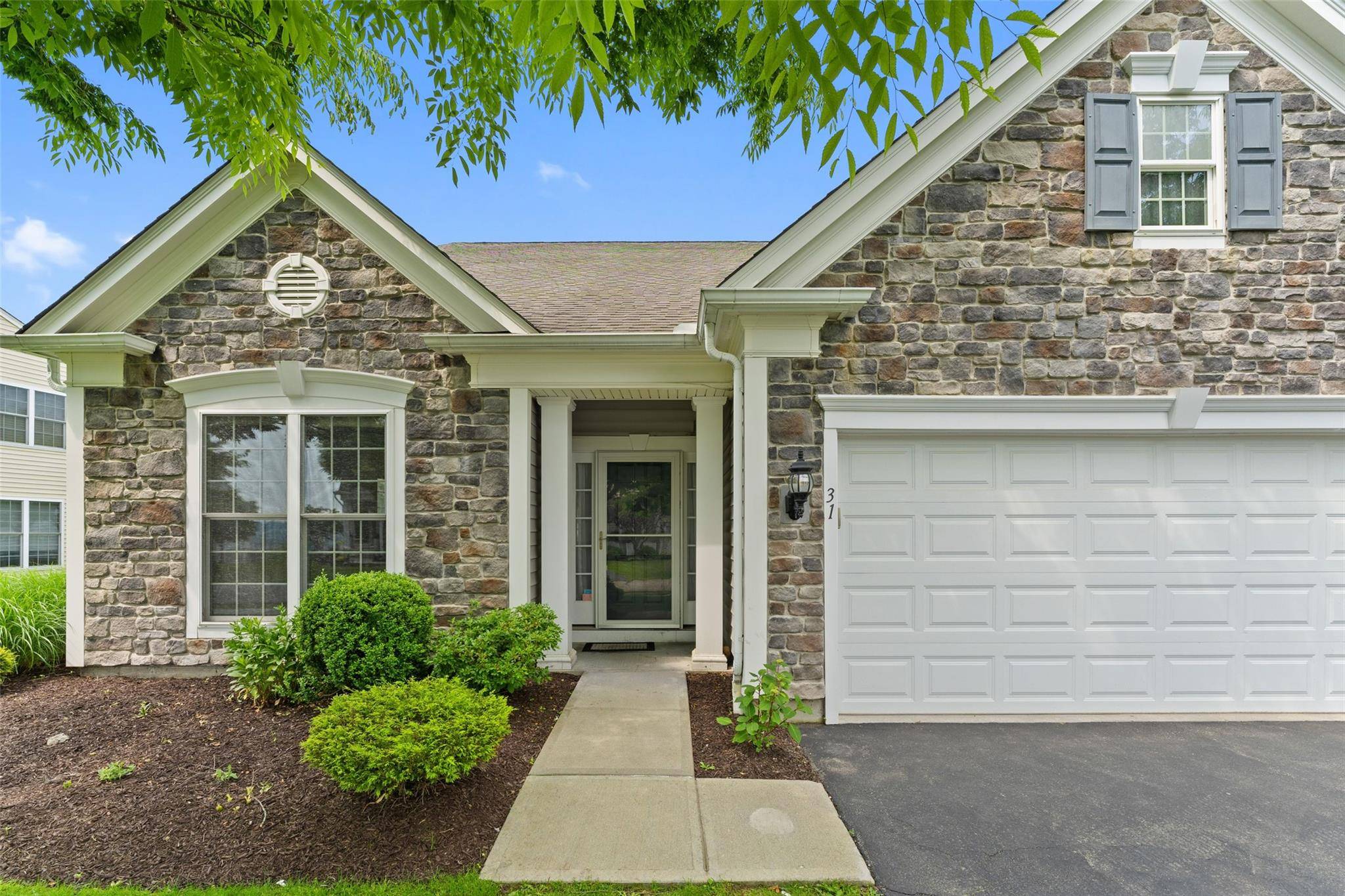 FULLY AVAILABLE ! Stunning end unit in a highly desirable 55 community, The Retreat.