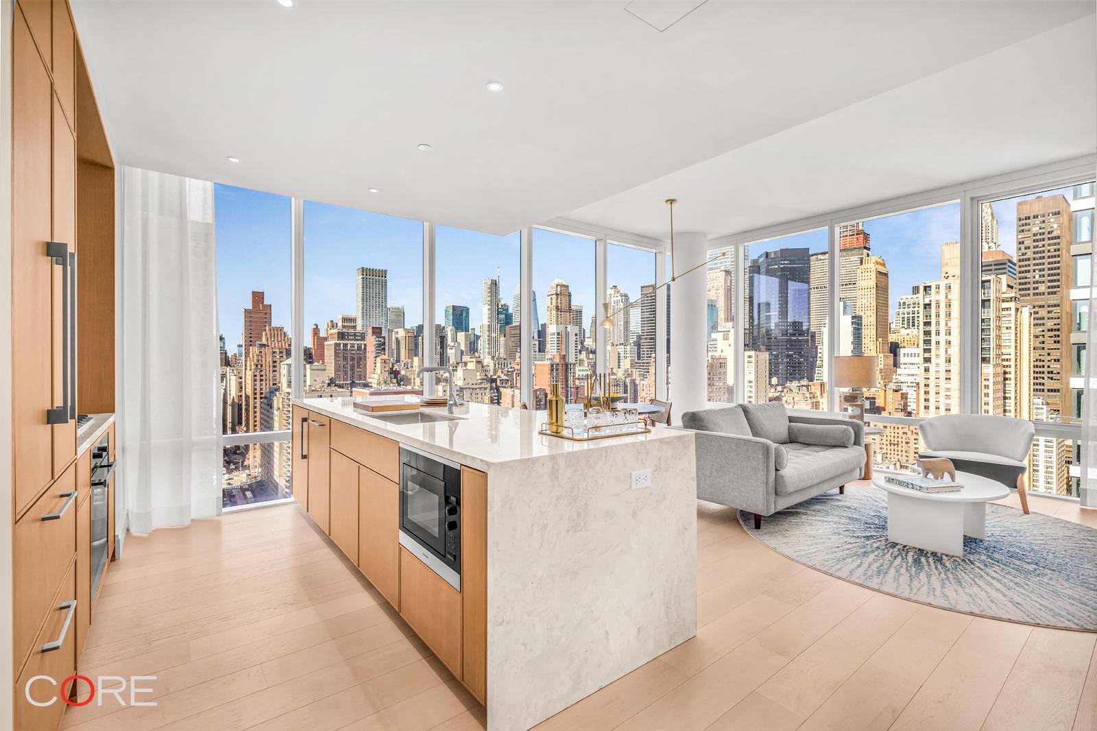 Private In Person amp ; Virtual Appointments Available Immediate Occupancy The north west corner living room has wraparound floor to ceiling, sound attenuated windows, enveloping the area in light.