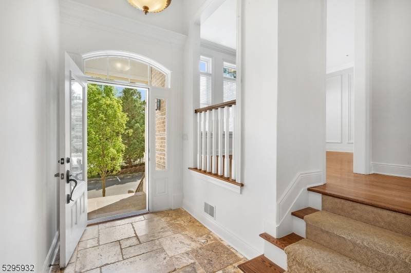 Sophisticated Avondale Model 4 Level Townhome located in The Brownstones at Convent Station.