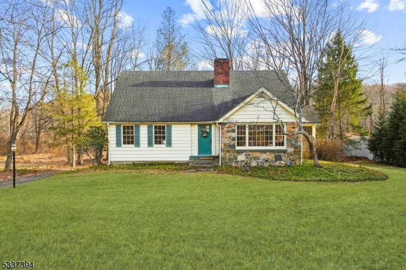 Discover this storybook Cape Cod nestled on a picturesque.