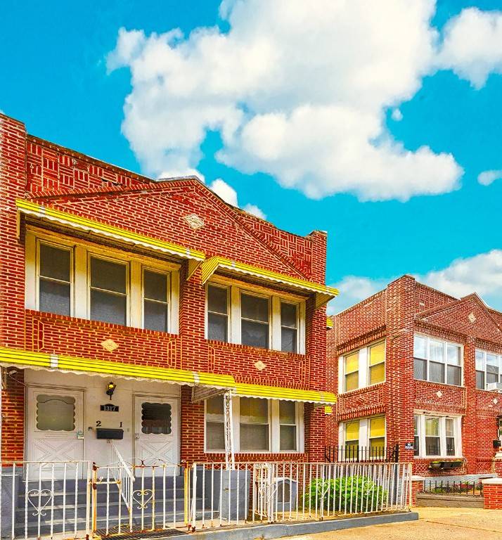 This red brick semi attached two family home was built in 1925.