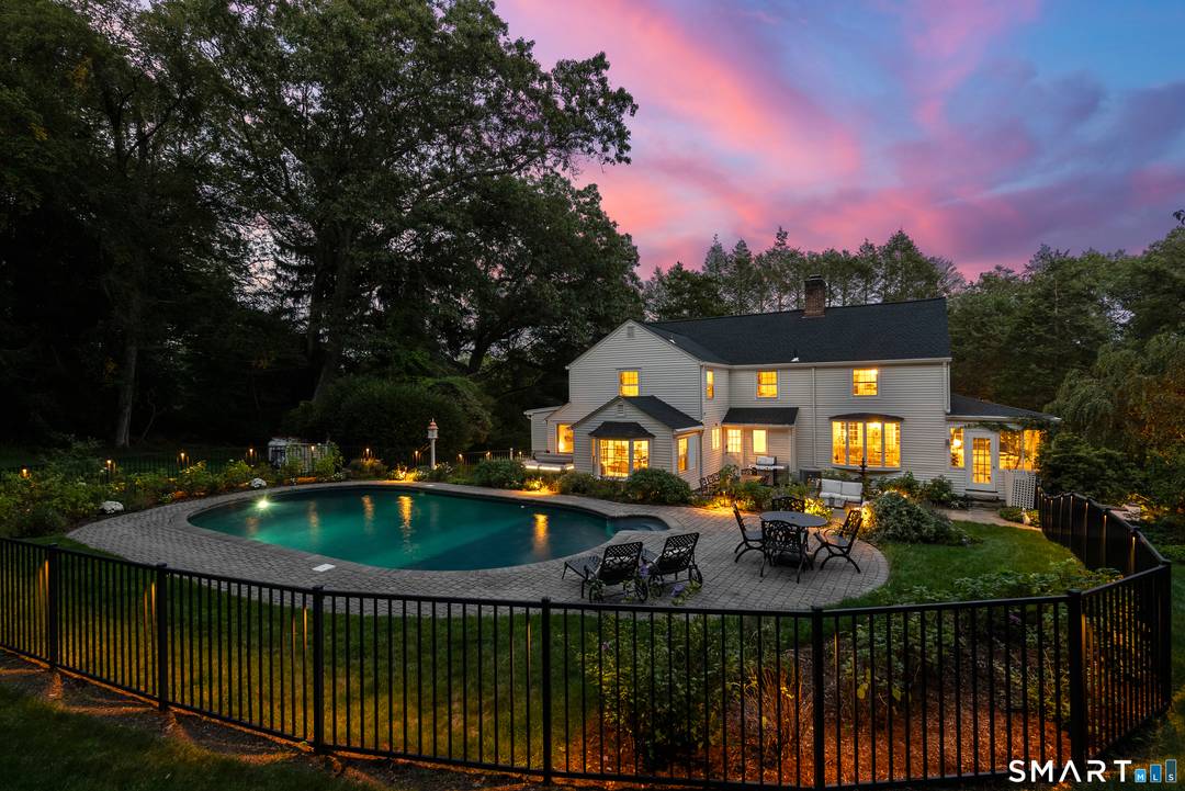 Set within one of the area's most coveted neighborhoods, this exceptional colonial residence embodies timeless elegance gracious Southern charm.