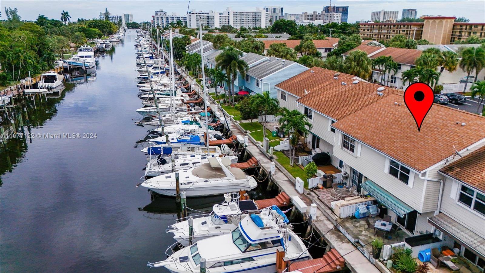 Step into this charming deep waterfront townhome and take in peaceful canal views from your private patio.