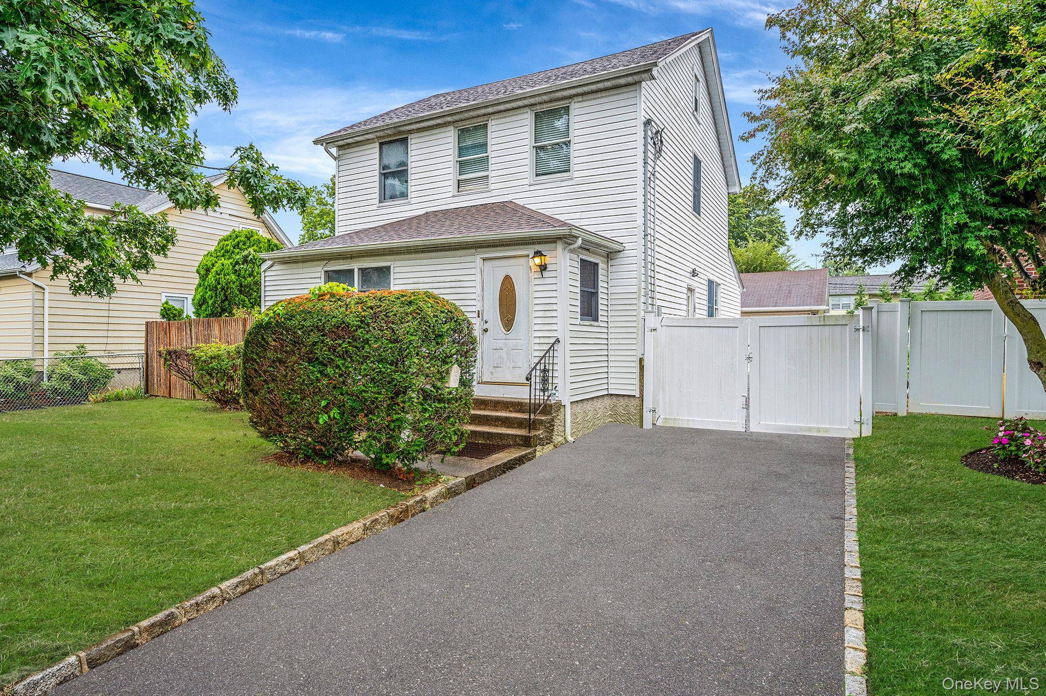 This well built legal TWO family DUPLEX type offers incredible space and versatility, spanning four full floors a first floor, second floor, full unfinished basement, and full attic.