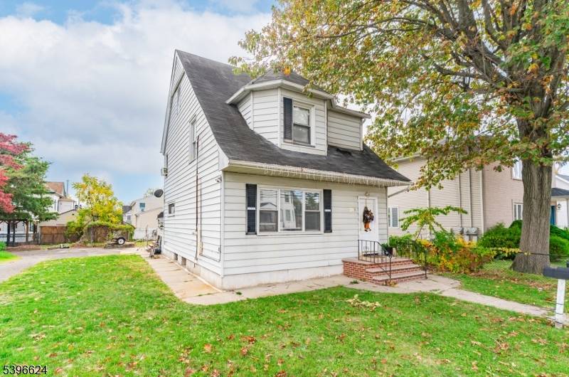 This bright and welcoming two family home in Clifton offers functional layouts and an abundance of natural light throughout.