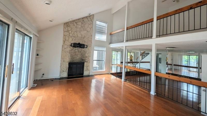 Welcome to 516 Westgate Dr, a stunning contemporary townhome nestled in the highly sought after Westgate Square community of North Edison.