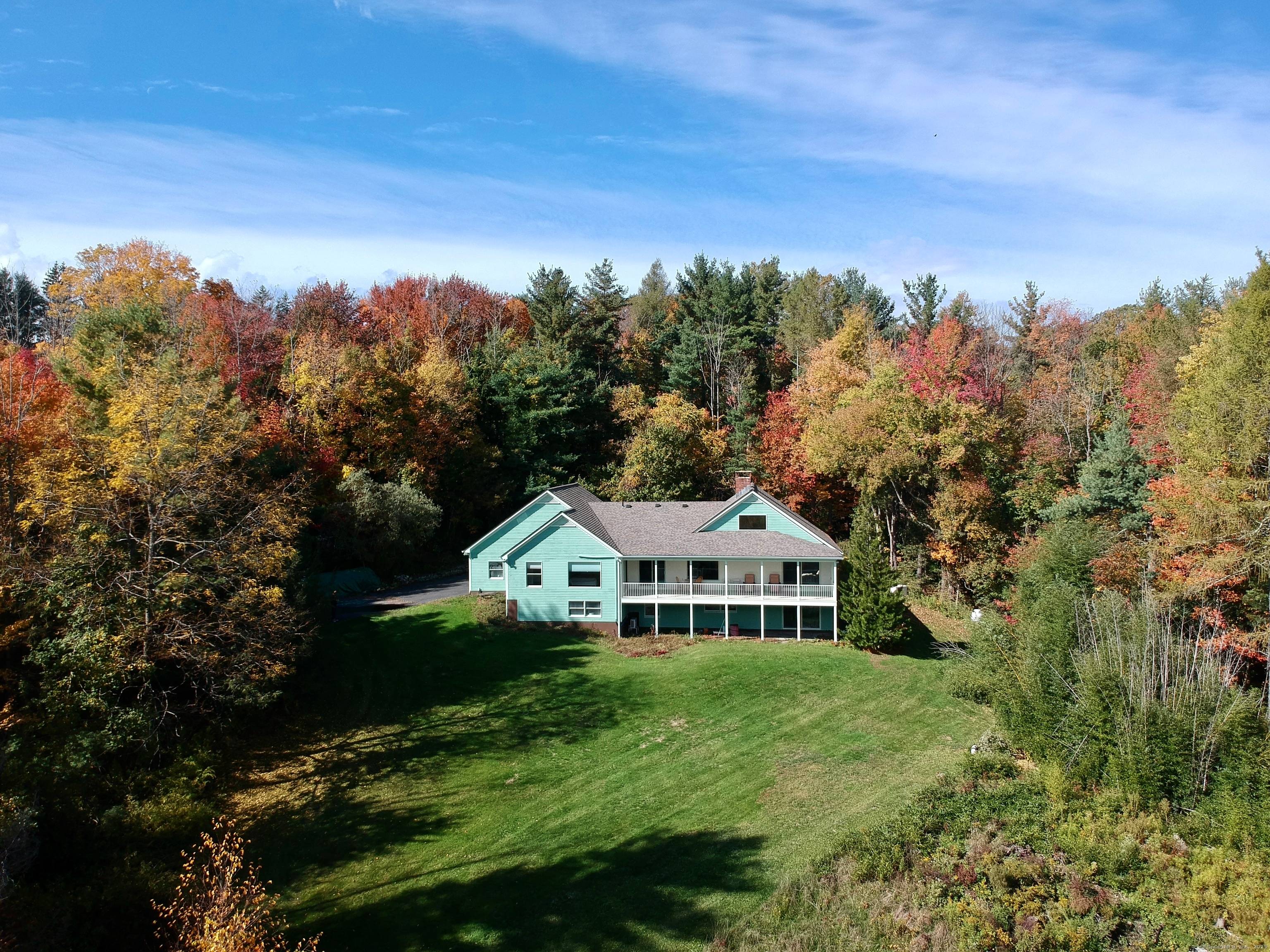 Discover a beautifully renovated country retreat featuring stunning views of Woodbury and the Litchfield County Hills.