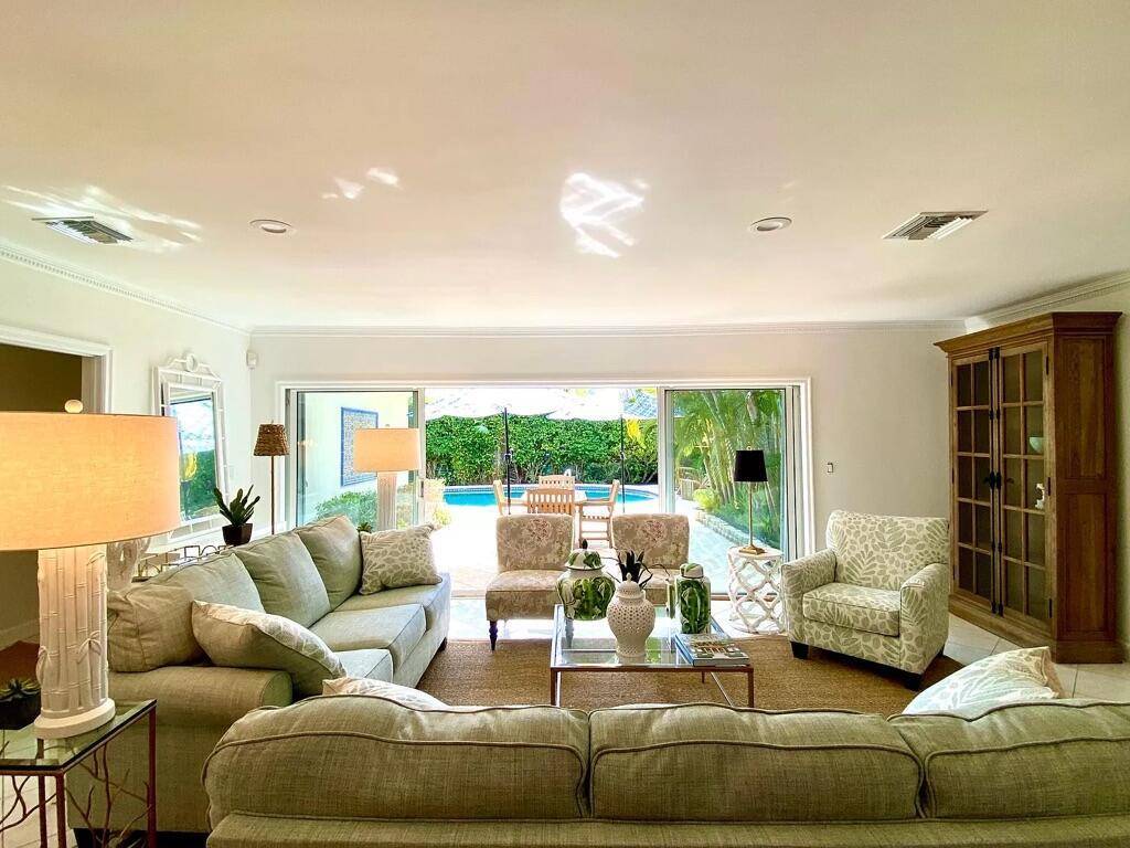 Exquisite Palm Beach Bermuda style single story home, on one of the most picturesque streets on the coveted North End available for seasonal rental.