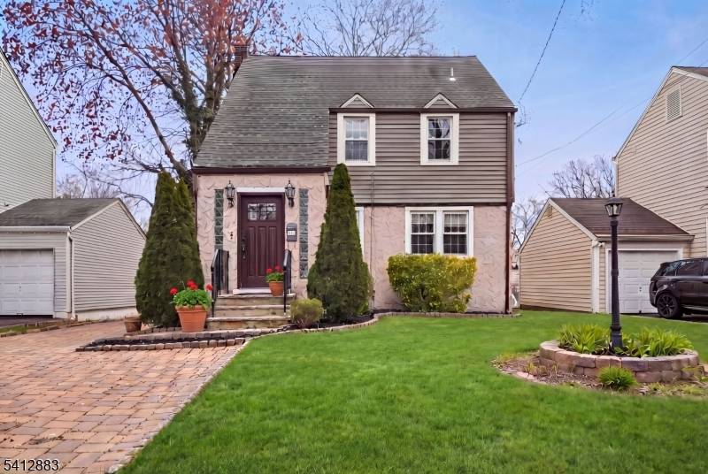 Spacious four bedroom, three full bath Colonial perfectly blends timeless character with modern updates.