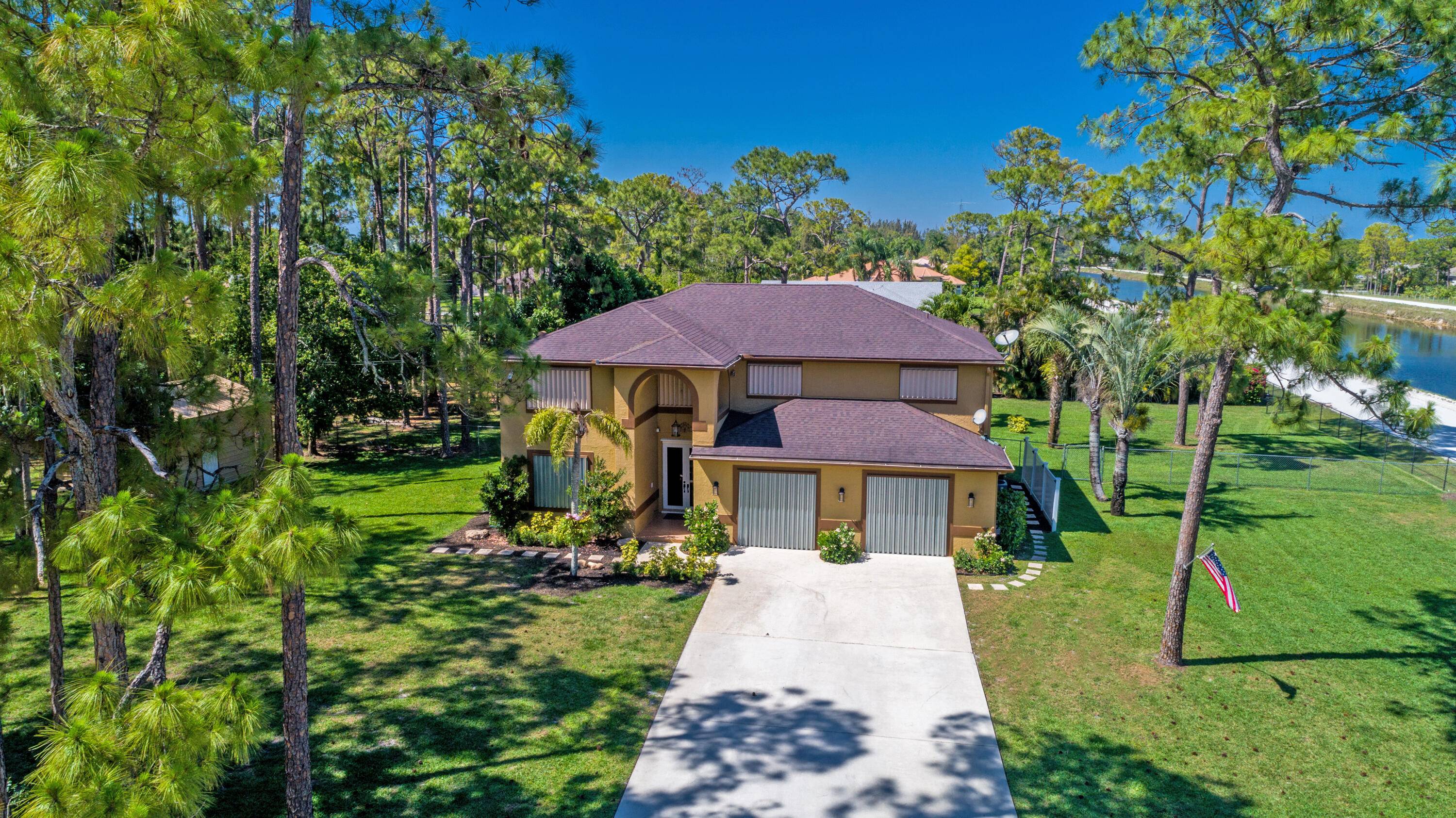 Beautifully maintained 4 br 3 bath 2 story house with pool on large lot 2 acres.