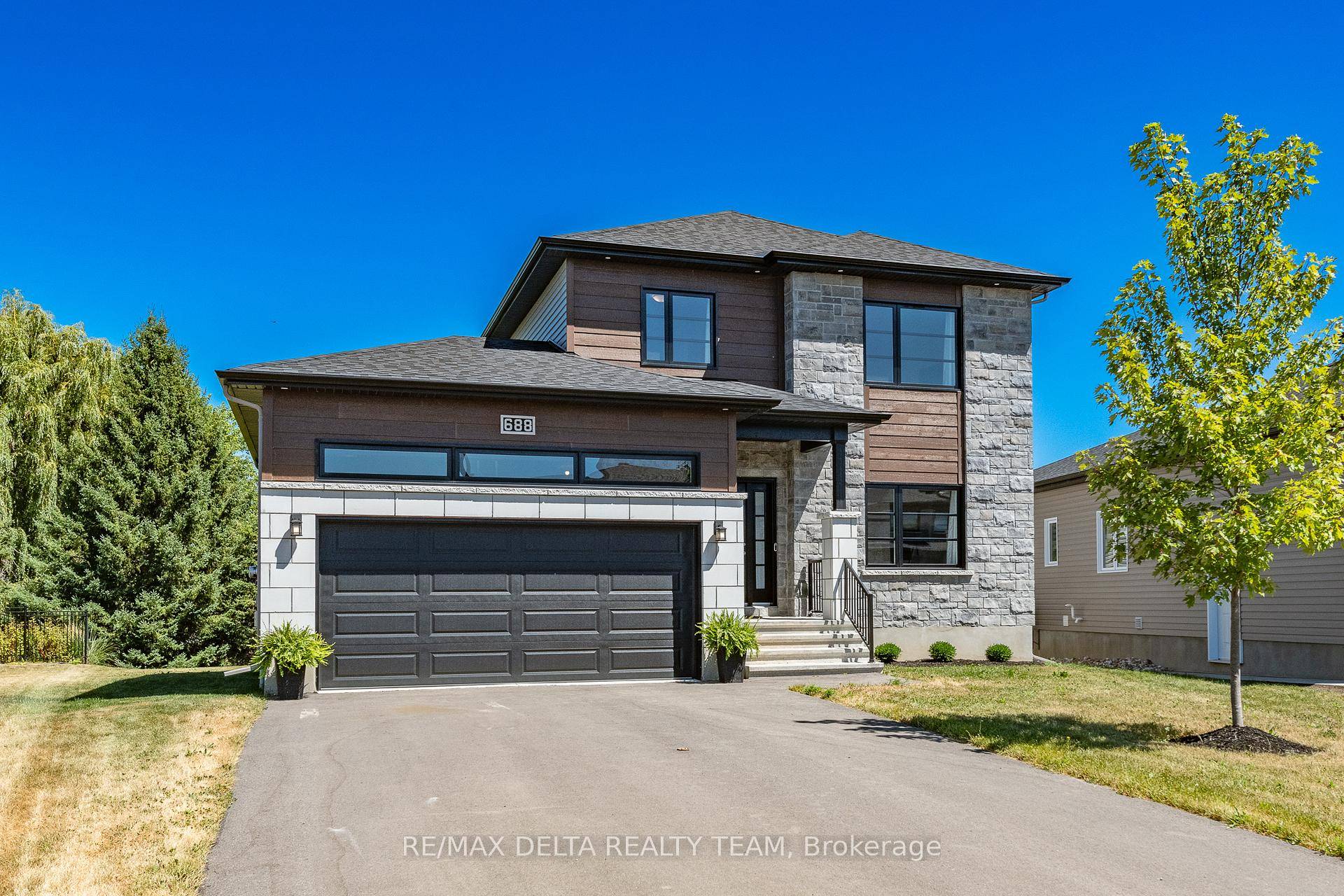 Absolutely stunning, meticulously maintained 4 bed, 3 bath den Vienna II model on a premium oversized lot lined with mature trees offering a serene setting.