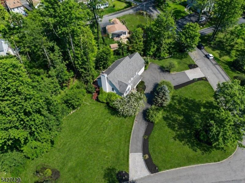 Just renovated perfectly positioned on a quiet, upscale cul de sac, this classic Center Hall Colonial delivers the rare combination of privacy, space, turnkey living on 1.