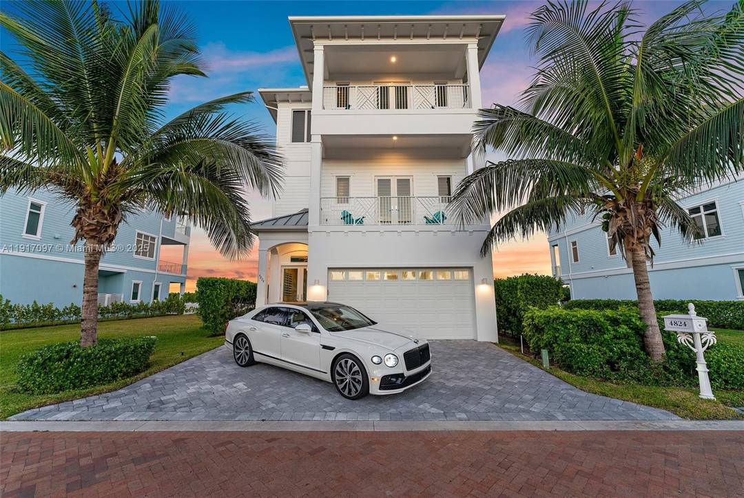 Experience coastal luxury and refined living in this stunning oceanfront home offering breathtaking views of both the Atlantic Ocean sunrise and intra coastal waterway sunset.