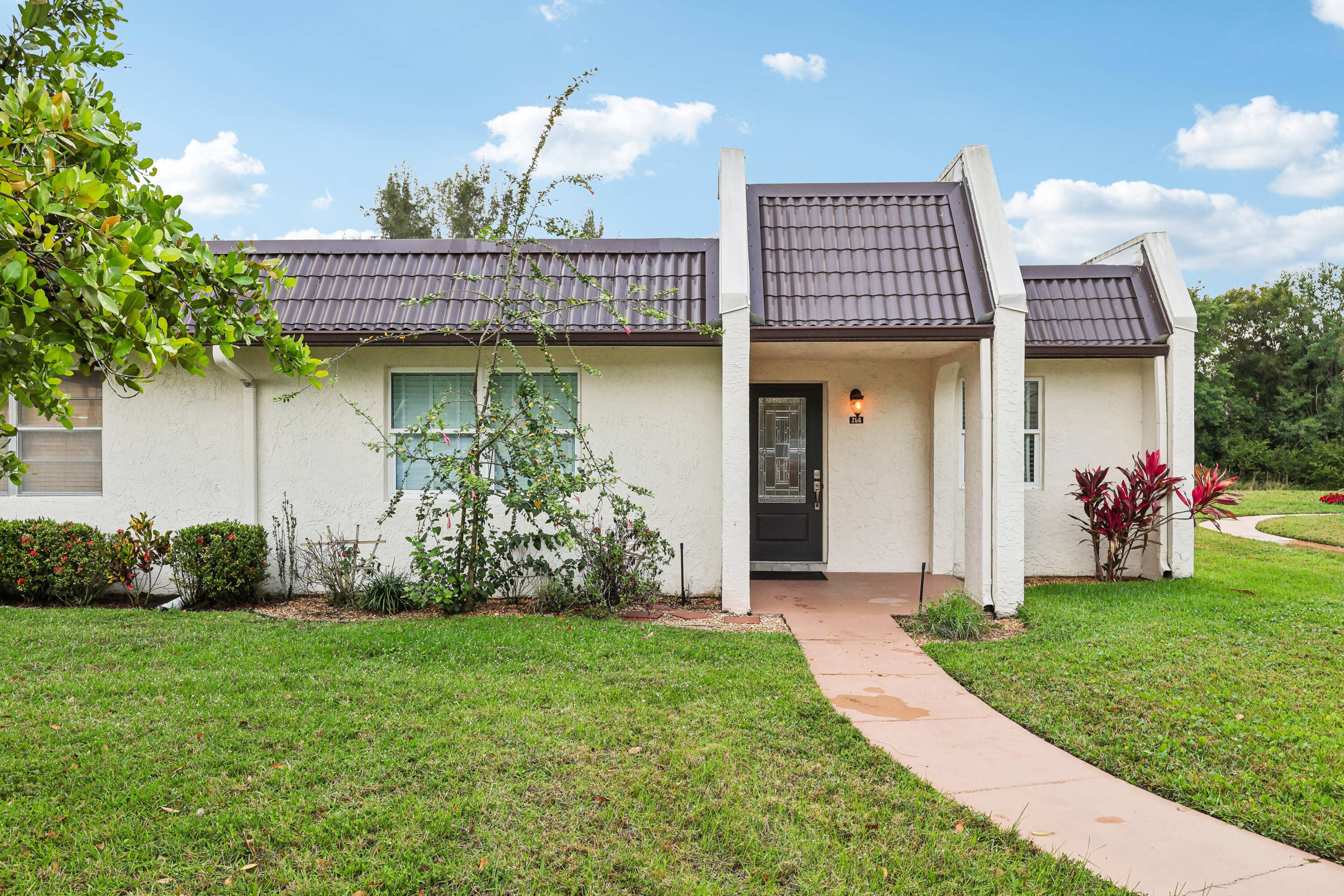 Bright, Spacious, Private, Immaculate, Updated, Corner Villa.
