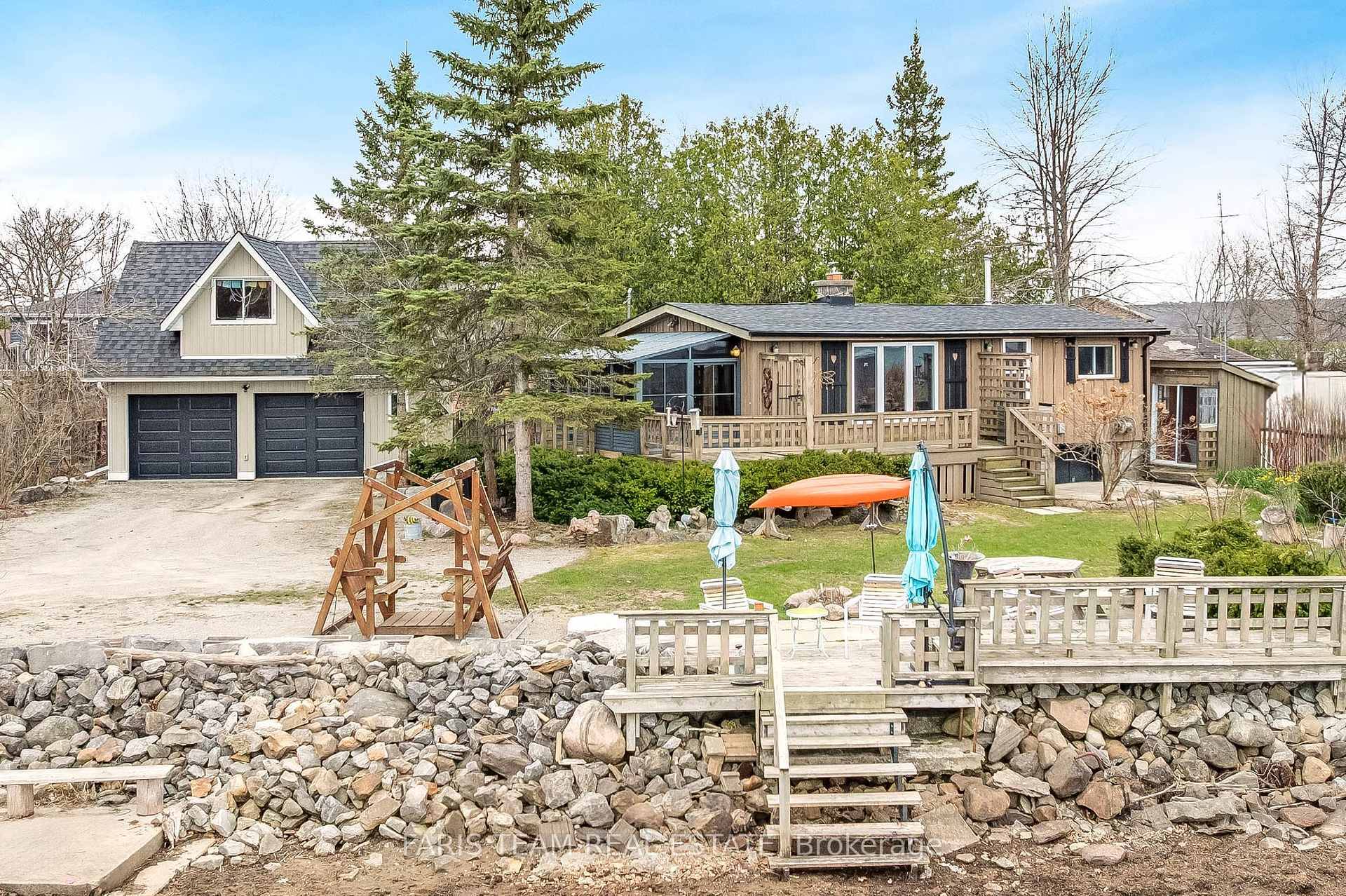 Top 5 Reasons You Will Love This Home 1 Charming year round home or cottage retreat, just minutes off Highway 400, an ideal summer getaway or peaceful escape in any ...